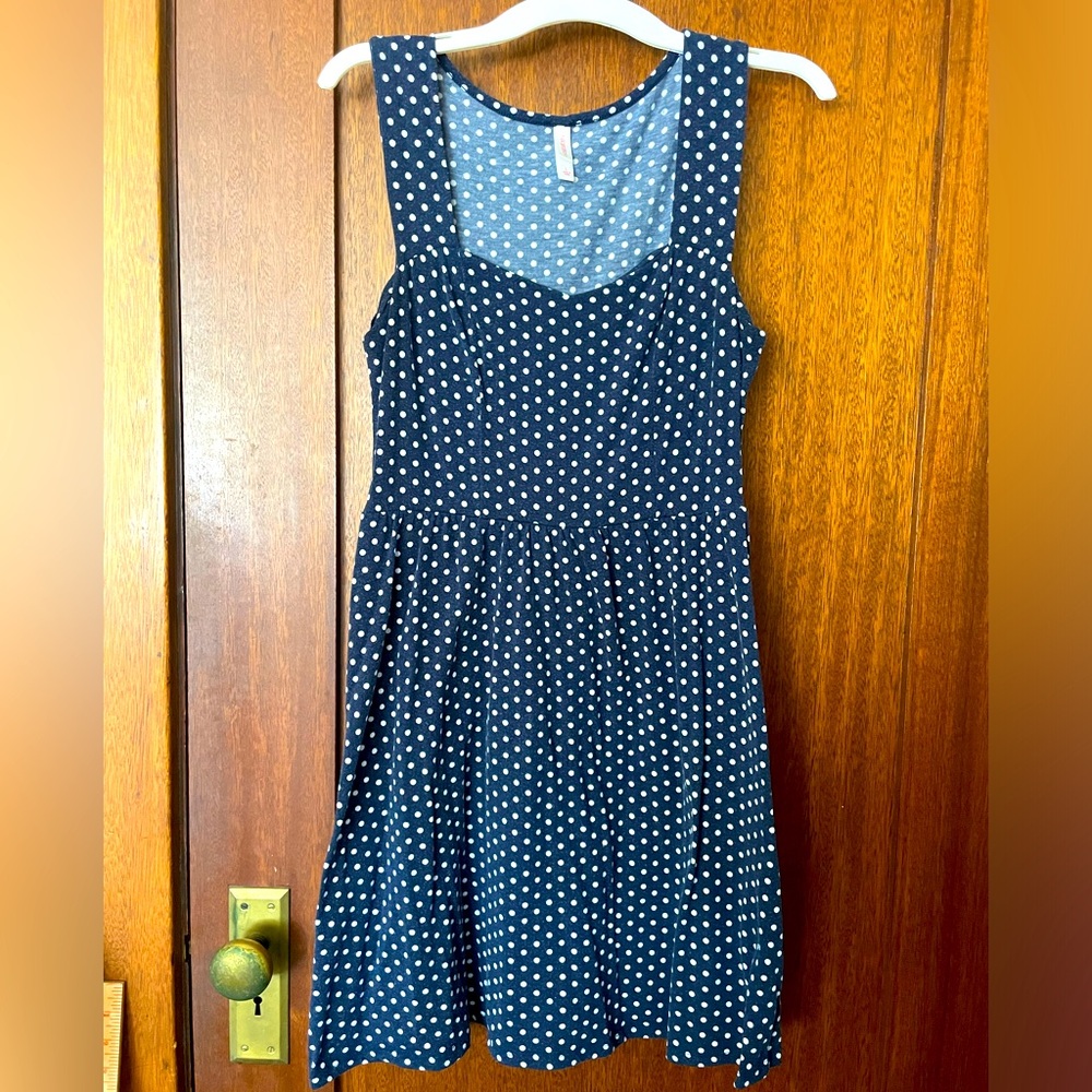 Adorable navy polka dot dress with a sweetheart neckline